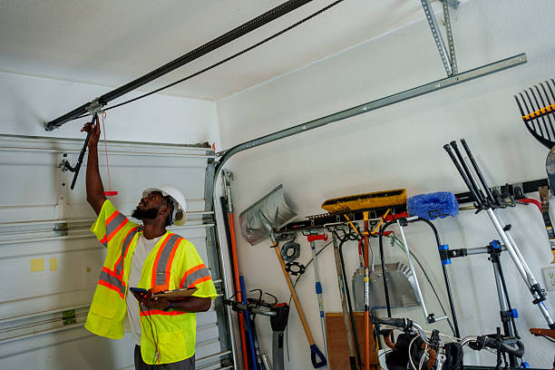 Professional Garage Door Panel Replacement technician working in Harrison County County, MS